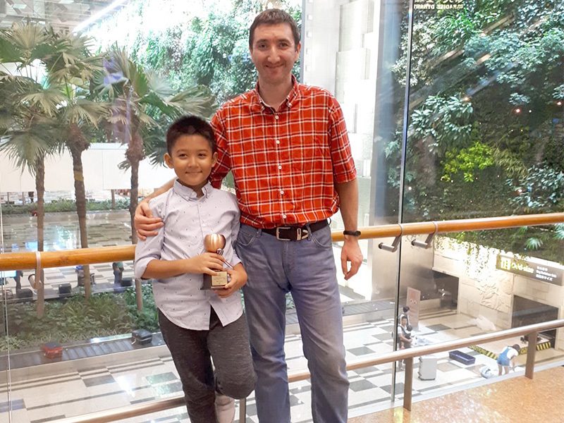 Adithya with the Singapore U10 bronze. Airport Changi, December 2018