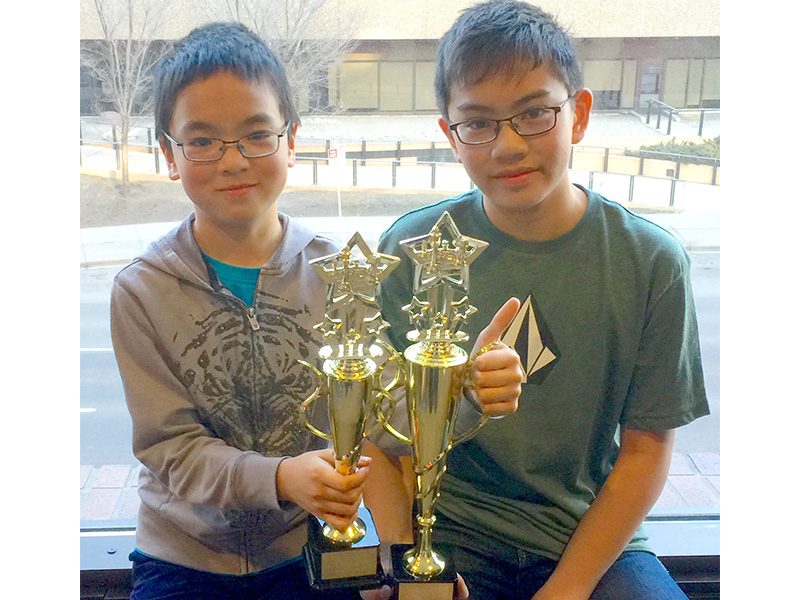 Ian (left) wins the Alberta, Canada, Youth Chess Championship, February 2016